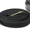 Rolled Road Bike Inner Tubes 700X28-32C With 60mm Presta Valve, Premium Butyl Rubber, 2 Pack, focus on valve and tube detail.