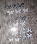 11 Piece Butterfly Metal Die Cuts Set For DIY Cards Scrapbooking And Embossing Frames Wedding Stencils on wood surface
