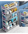 Premium 304 Stainless Steel Five Tier Storage Rack With Adjustable Height Heavy Duty Kitchen Shelving Unit filled with kitchenware.
