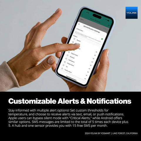Person using smartphone displaying settings for LoRa Based Smart Wireless Thermometer With No WiFi Needed And Long Range Temperature Monitoring For Freezers Fridges Greenhouses And Pet Cages App Alerts Via Email And Text Battery Lasts Up To Five Years Hub Required