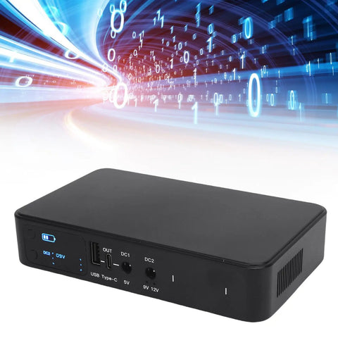Heavy Duty UPS Power Supply With 18000mAh Battery Backup Keeps Routers And Security Cameras Running Smooth During Unexpected Blackouts showing black unit with ports.