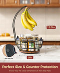 Smooth Spinning 360 Degree Rotating Fruit Bowl With Hefty Capacity Deep Basket And Solid Banana Stand, 15.5in tall, 9in wide with bananas and spices.