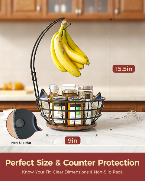 Smooth Spinning 360 Degree Rotating Fruit Bowl With Hefty Capacity Deep Basket And Solid Banana Stand, 15.5in tall, 9in wide with bananas and spices.