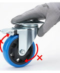 Close-up of four inch heavy duty swivel caster wheels with dead lock brakes and silent non marking polyurethane tires.