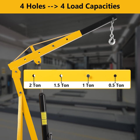 Yellow 2 Ton Cherry Picker Engine Hoist With Folding Hydraulic Crane and Six Swivel Castors in Auto Repair Shop