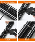 Stainless Steel Cable Tie Gun Set With 300 Black Zip Ties used for tightening and cutting metal ties on black pipes.