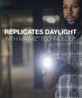 Person using Vision HD Ultra LED Flashlight With Digital Focus, 1800 Lumens, IPX4 Water Resistant, rugged build.