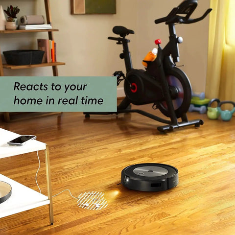 J7 Plus Self Emptying Vacuum Cleaning Robot Renewed Black Delivers Powerful Suction, Smart Navigation, in a home gym.