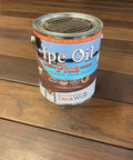 Premium Semi Transparent Hardwood Deck Oil Finish Provides Real Deal Protection For Exterior Fences And Railings With A Smooth Natural Look And Strict VOC Codes Tailored For Backyard Bosses Wanting A Stress Free Refresh Using Bulk Packs Of Six One Gallon can on wooden surface.