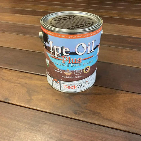 Backyard Ready Natural Semitransparent Hardwood Deck Oil And Stain Ultra Low Voc Exterior Wood Finish For Ipe Decks Fences And Railings No Sweat Fade Proof Sealant 4 Pack Of 1 Gallon Jugs can 1-gallon jug on wooden surface.