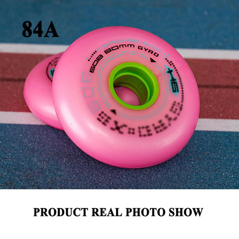 Close-up of pink All Terrain Inline Skate Wheels 8 Pack Durable 84A 72mm 76mm 80mm Replacement Rollers on track