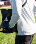 Person using Spyker 25lb Bag Spreader With Material Viewing Window And Easy Calibration System on lawn