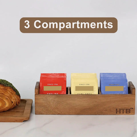 Three Compartment Wooden Tea Bag Box With Handle Acacia Wood Caddy For Tea Bags Sugar Packets Creamers And More Go To Countertop Organizer For Beverage Supplies Perfect Kitchen Desk Storage displayed on a countertop with colorful tea bags.