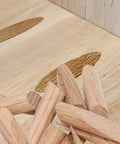Fifty Pack Solid Wood Pocket Hole Plugs Blend Into A Legit Clean Finish On Any Woodworking Build, solid oak plugs aligned with drilled holes.