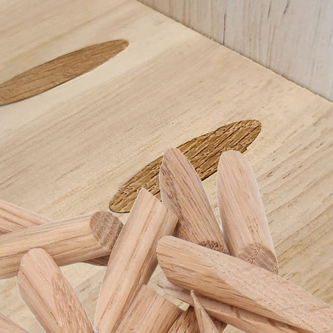 Fifty Pack Solid Wood Pocket Hole Plugs Blend Into A Legit Clean Finish On Any Woodworking Build, solid oak plugs aligned with drilled holes.