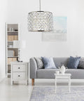 Hella Sweet Madison 8 Light Pendant With Royal Cut Crystals Polished Nickel Finish Transitional Hanging Lamp E12 Base Solid Pick For Dining And Living Room above gray sofa in modern living room setting.