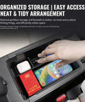 Custom Cut Center Console Organizer For Tesla Cybertruck 2024 And 2025 Armrest Box Storage Tray showing organized storage with phone and items.