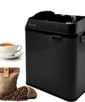 No Sweat Coffee Game Changer Electric Portafilter Cleaner With Knock Box For Home Or Cafe Includes Two 58 Millimeter Scrapers Plus White Cleaning Brush Head next to coffee.