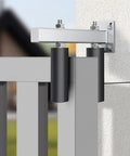 Close-up of Beefy 6 Inch Sliding Gate Guide Roller With UHMW Nylon Rollers And Steel Bracket Adjustable Range Five Point Five Inches