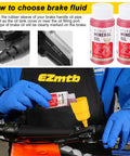 Gloved hands using Hydraulic Brake Bleed Kit For Shimano Tektro Magura And Other Mineral Oil Brakes Includes 120ml Pro Grade Fluid