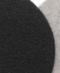 Close-up of Solid 30 Pack Of Carbon Silicone Sanding Discs showing textured black surface, for auto metal wood polishing.