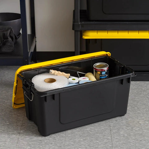 Top Shelf 21 Gallon Storage Totes 4 Pack Heavy Duty Lockable Bins With Airtight Weatherproof Gasket Seal Keeps Your Loot Safe And Sound Black Yellow Made In Usa, open bin with supplies inside.
