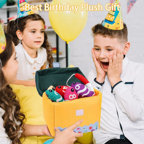 Child opening My First Tackle Box Plush Set For Toddlers With 10 Piece Sensory Plushies Including Nine Fish Plush And A Fishing Rod Plush