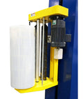 Ready To Run Automatic Stretch Wrap Machine With Loading Ramp Includes Built In Scale Weighs 5000 Pounds Prints Thermal Labels Instantly showing motor and film roll.
