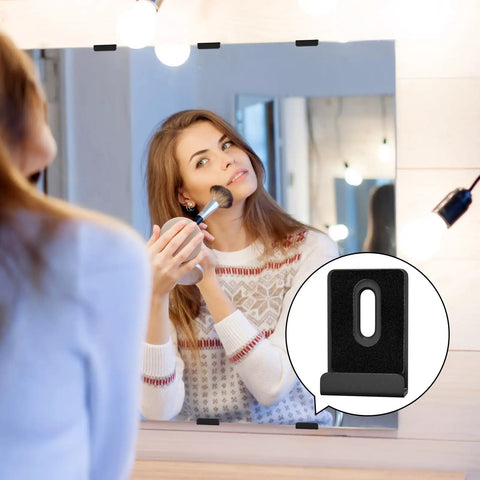 6 Piece Heavy Duty Metal Mirror Clips Set For Wall Mounting Powder Coated Rust Resistant J Brackets With Bulletproof Grip And Easy Zero Hassle Setup For Big Heavy Mirrors Matte Black, shown in use on vanity mirror.