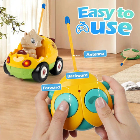Hands holding remote for Remote Control Dinosaur Car Toy Two Pack With Lights And Music For Toddlers Boys Ages 2 To 5 Interactive RC Dino.