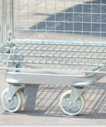 Open Frame Wire Mesh Rolling Cage Cart For Ventilated Transport And Logistics, Heavy Duty Dolly With Easy Mobility, Ideal For Textiles, Fresh Produce, And Warehousing Goods. Silver wire mesh cart with casters