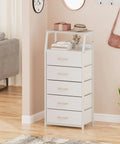 Five Drawer White Dresser With Wood Top And Steel Frame, Vertical Fabric Storage Tower in a modern living room.