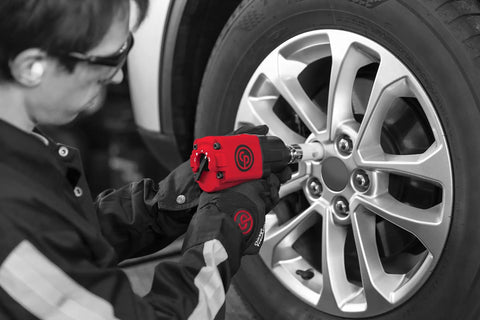 Mechanic using CP7741 Half Inch Air Impact Wrench With Twin Hammer Power For Auto Repair And Shop Pistol Grip Design Ultra Fast 10000 RPM