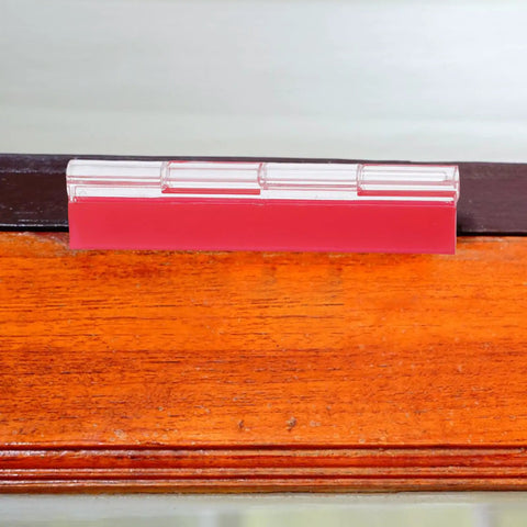 Self Adhesive Acrylic Hinges Pack Flush Mini Cabinet Hinges With Strong Double Sided Adhesive on wooden surface.