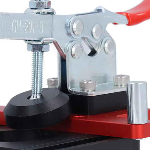 Close-up of Dead On Accuracy Drawer Punch Locator showing metal components for drilling alignment in woodworking projects.