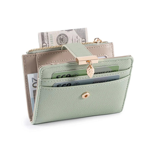 Ultra Slim Women Wallet With RFID Blocking Bifold Soft Leather Card Holder With ID Window Zipper Coin Pocket Seven Card Slots And Cash Pocket Minimalist Compact Design For Everyday Carry Green showing contents in slots