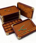 Slick Top Tier Jewelry Display Tray With Heavy Duty Wood Frame And Soft Fabric Lining No Sweat 24 Grid Stackable Organizer For Rings Earrings Necklaces Retail Ready Storage Case Black showing green necklace and earrings.