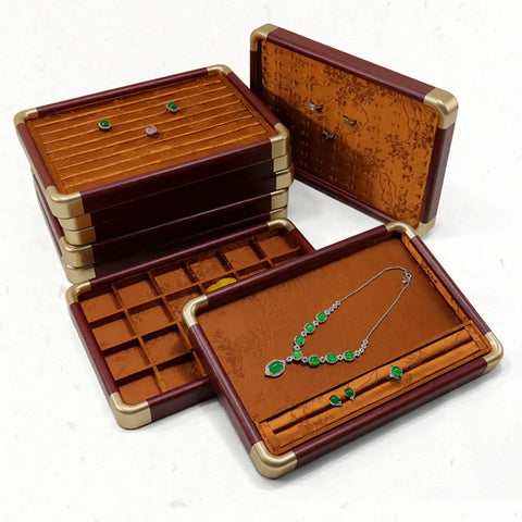 Slick Top Tier Jewelry Display Tray With Heavy Duty Wood Frame And Soft Fabric Lining No Sweat 24 Grid Stackable Organizer For Rings Earrings Necklaces Retail Ready Storage Case Black showing green necklace and earrings.