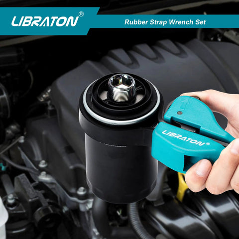 Two Piece Rubber Strap Wrench Set for auto oil filter jar lids adjustable from 10mm to 150mm in use on an engine