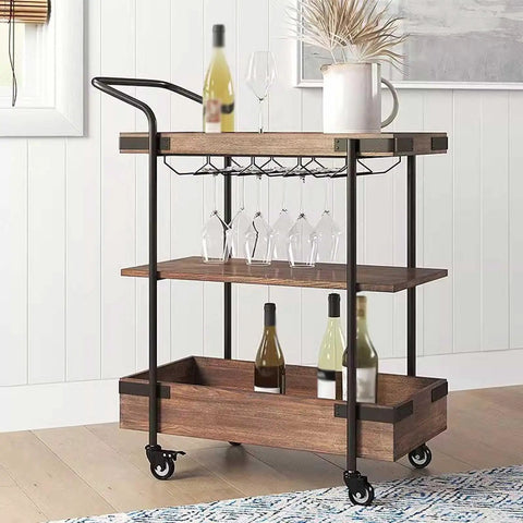 No Sweat Solid Three Tier Industrial Storage Serving Cart With Smooth Rollers Multifunctional Kitchen Bar Trolley For Home Rustic Wood And Metal Rolling Rack Vintage Brown with glasses and bottles.