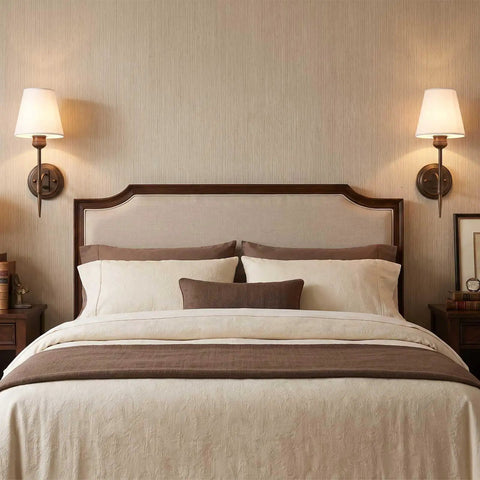 YS.ESUDSI Vintage Wall Sconces with White Fabric Shade Hardwired E26 Base mounted beside a stylish bed in a cozy bedroom.