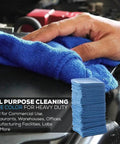 90 Pack Blue Cotton Shop Towels 14 By 12 Inches Reusable Rags For Auto Garage Industrial And Home Cleaning with hand in use