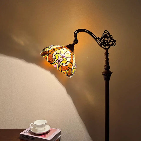 Tiffany Style Stained Glass Reading Floor Lamp With Antique Arched Tall Design 62 Inch Standing Lamp illuminating a warm ambient light
