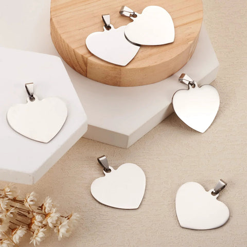 Front view of heart-shaped stainless steel pendant charms with snap-on bails, 33mm for DIY jewelry making