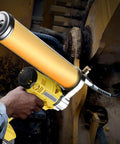 Beefy 8500 PSI Electric Grease Gun With Battery Powered Automatic Lubrication For Industrial Machinery Ships And Construction Equipment 100-240V US For Industrial Maintenance And Heavy Equipment in use.