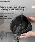 Hands washing inner pot of Compact 2.1 Quart Smart Rice Cooker With Steamer Basket, BPA-free non-stick surface visible