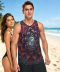 Premium Mens Workout Tank Top With Dope Mechanical Flower Gears Stars Print worn by man on beach, quick dry mesh, sleeveless, relaxed fit.