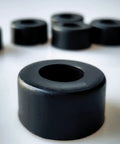 Close-up of Air Compressor Rubber Foot Pads Set Of Four For Vibration Reduction And Stable Operation, showing pad details.