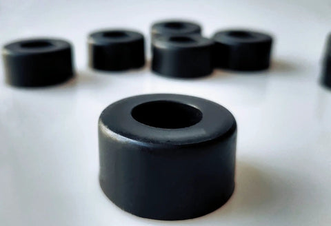 Close-up of Air Compressor Rubber Foot Pads Set Of Four For Vibration Reduction And Stable Operation, showing pad details.