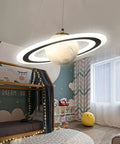 LED Modern Pendant Light With Planet Ring Design Three Color Changing Ceiling Fixture In Yellow in a children's room setting.